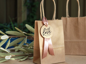 Kraft brown paper bag with ribbon and personalised tags